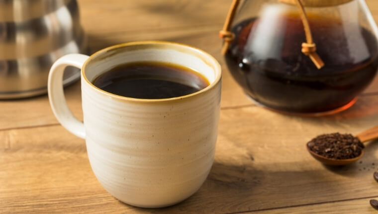 A delicious cup of coffee prepared with Chemex the best pour-over coffee maker