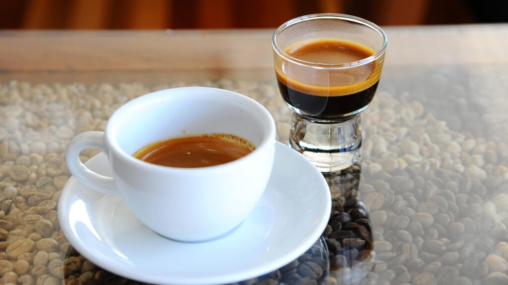 Ristretto and espresso coffee on the glass table