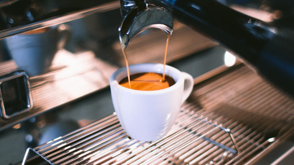 espresso coffee maker preparing a delicious cup of espresso