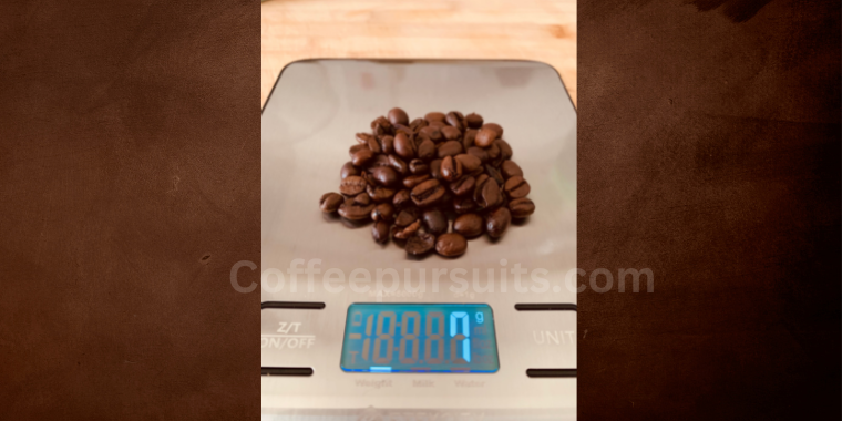 Photo of my experiment where I used my kitchen scale and measured how many beans goes for 1 espresso shot
